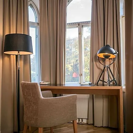 Living Scholler Hotel 3*