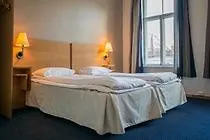 Living Scholler Hotell 3*